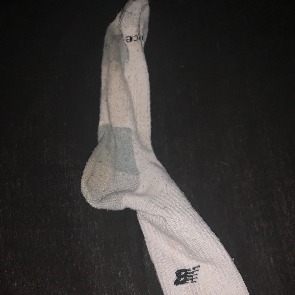 One New Balance Sock